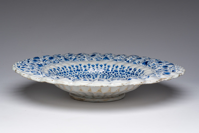 A blue and white Haarlem faience dish with 'The flight into Egypt', late 17th C.