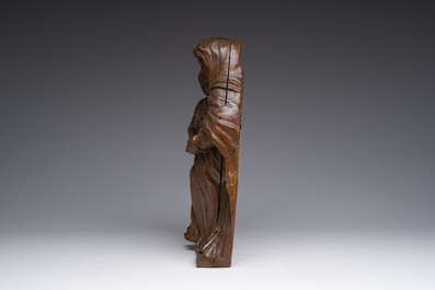 A Flemish oak group depicting Saint Anne teaching Mary to read, 19th C.