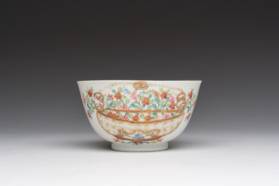 A Chinese famille rose 'flower basket' cup and saucer, Qianlong