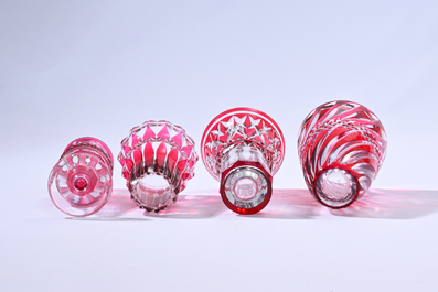 Nine partly coloured overlay cut crystal vases, Val Saint Lambert, Belgium, 20th C.