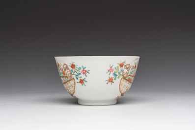 A Chinese famille rose 'flower basket' cup and saucer, Qianlong