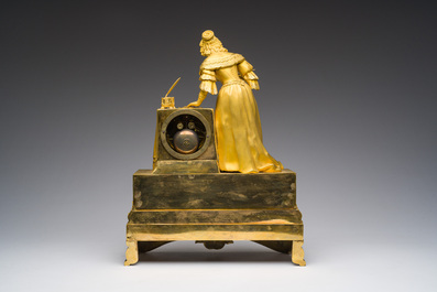 A fine French gilt bronze mantel clock crowned with a writing lady, 19th C.
