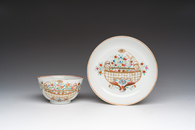 A Chinese famille rose 'flower basket' cup and saucer, Qianlong