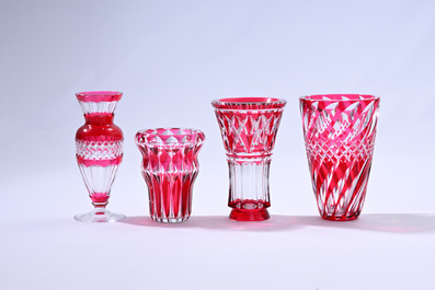 Nine partly coloured overlay cut crystal vases, Val Saint Lambert, Belgium, 20th C.