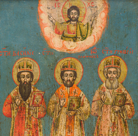 A double-sided Russian orthodox icon, 'Three Holy Hierarchs' and 'The betrayal of Jesus Christ by Judas Iscariot', 19th C.