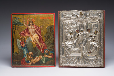 Two Russian orthodox icons with (silver-plated) brass oklad or riza, 'The Resurrection of Christ' and 'The Nativity of the Mother of God', 19th C.