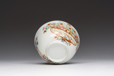 A Chinese famille rose 'flower basket' cup and saucer, Qianlong