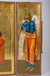 A Gothic Revival parcel-gilt Crucifixion triptych and two gilt-ground icons, 20th C.