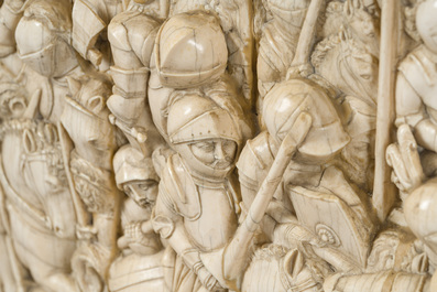 A museal and impressive carved ivory relief depicting a battle from the Hundred Years' War, probably Dieppe, 19th C.