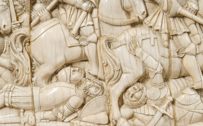 A museal and impressive carved ivory relief depicting a battle from the Hundred Years' War, probably Dieppe, 19th C.