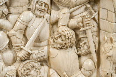 A museal and impressive carved ivory relief depicting a battle from the Hundred Years' War, probably Dieppe, 19th C.
