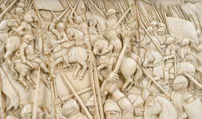 A museal and impressive carved ivory relief depicting a battle from the Hundred Years' War, probably Dieppe, 19th C.