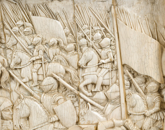 A museal and impressive carved ivory relief depicting a battle from the Hundred Years' War, probably Dieppe, 19th C.