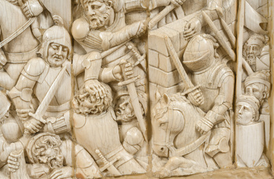 A museal and impressive carved ivory relief depicting a battle from the Hundred Years' War, probably Dieppe, 19th C.