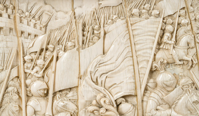 A museal and impressive carved ivory relief depicting a battle from the Hundred Years' War, probably Dieppe, 19th C.