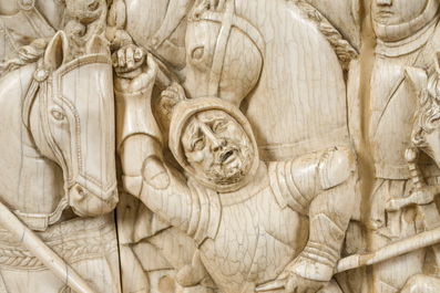 A museal and impressive carved ivory relief depicting a battle from the Hundred Years' War, probably Dieppe, 19th C.