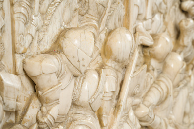 A museal and impressive carved ivory relief depicting a battle from the Hundred Years' War, probably Dieppe, 19th C.