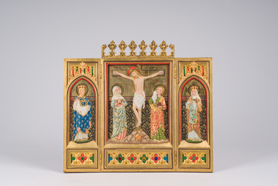 A Gothic Revival parcel-gilt Crucifixion triptych and two gilt-ground icons, 20th C.