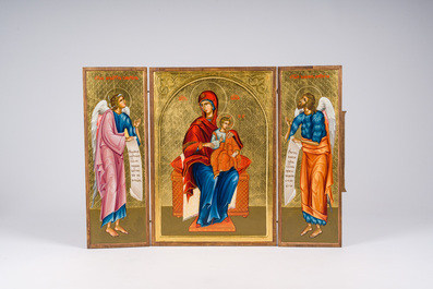 A Gothic Revival parcel-gilt Crucifixion triptych and two gilt-ground icons, 20th C.