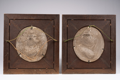 Belgian school: A pair of terracotta patinated plaster portrait reliefs of Arthur Belpaire and his wife, dated 1870