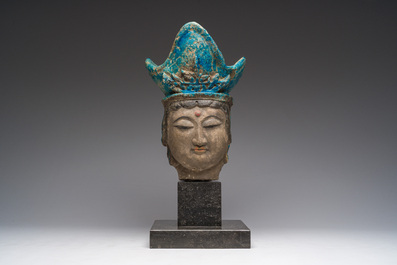 A large Chinese partly turquoise-glazed pottery head of Guanyin in Ming style, probably 19th C.