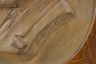 Belgian school: A pair of terracotta patinated plaster portrait reliefs of Arthur Belpaire and his wife, dated 1870