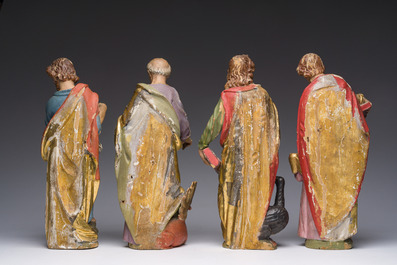 Four polychrome decorated wooden 'evangelist' sculptures, 19th C.