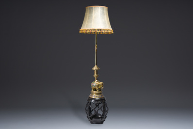 A reticulated Chinese wooden stand with marble top and a French gilt brass and champlev&eacute; 'elephant' lamp, 20th C.