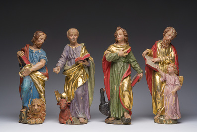 Four polychrome decorated wooden 'evangelist' sculptures, 19th C.