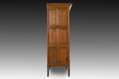 A Flemish oak two door cupboard with cast iron hinges, 17th C.
