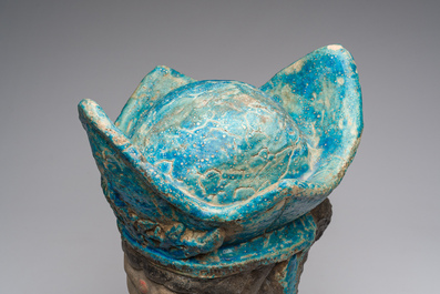 A large Chinese partly turquoise-glazed pottery head of Guanyin in Ming style, probably 19th C.