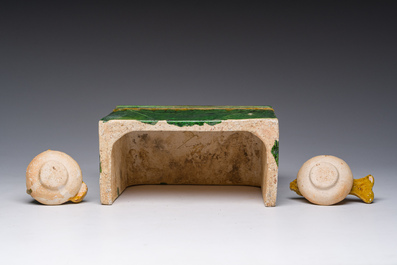 A Chinese sancai glazed miniature offering table with a fish and a pig's head, probably Ming