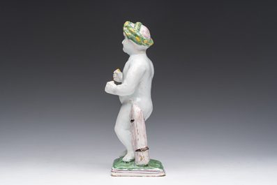 A polychrome Brussels faience allegorical sculpture depicting one of the four seasons, 19th C.