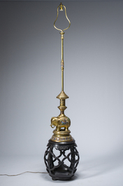 A reticulated Chinese wooden stand with marble top and a French gilt brass and champlev&eacute; 'elephant' lamp, 20th C.