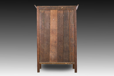 A Flemish oak two door cupboard with cast iron hinges, 17th C.