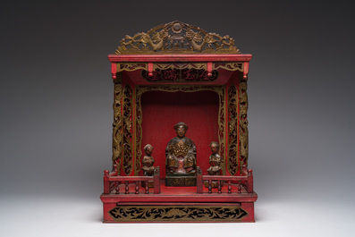 A Chinese gilt-lacquered wooden home altar with figures, 19th C.