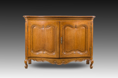 A Li&egrave;ge oak Louis XV buffet, 18th C.
