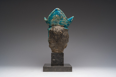 A large Chinese partly turquoise-glazed pottery head of Guanyin in Ming style, probably 19th C.