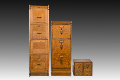 Two wooden filing cabinets, Globe Wernicke and Au Ch&ecirc;ne Vert, and a four compartment storage box, 19th/20th C.