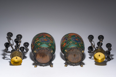 A pair of Japanese cloisonn&eacute; vases with French partly gilt bronze chinoiserie candelabra mounts, 19th C.