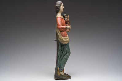 A Flemish polychromed wooden sculpture of The Madonna with Child, 18th C.