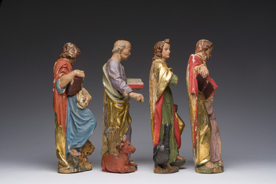 Four polychrome decorated wooden 'evangelist' sculptures, 19th C.