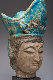 A large Chinese partly turquoise-glazed pottery head of Guanyin in Ming style, probably 19th C.