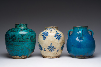 Three blue, white and turquoise Persian Qajar jars, 19th C.