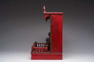A Chinese gilt-lacquered wooden home altar with figures, 19th C.