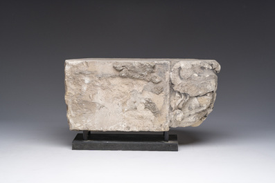 A Romanesque carved stone corbel with a grotesque head, probably France, 14th/15th C.