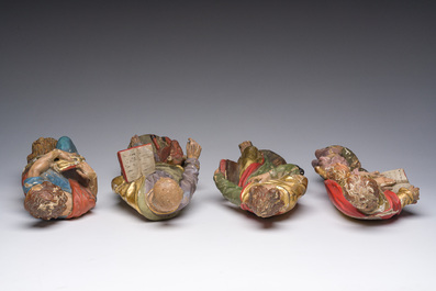 Four polychrome decorated wooden 'evangelist' sculptures, 19th C.