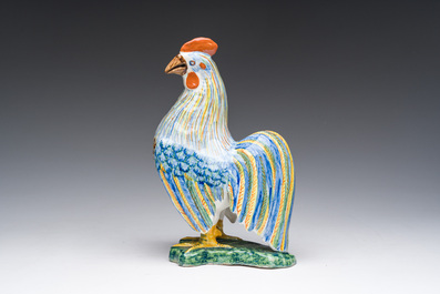 A polychrome Delftware model of a rooster, probably Desvres, France, 19th C.