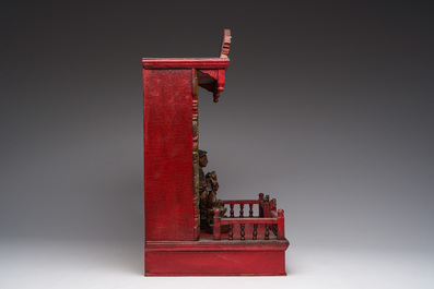 A Chinese gilt-lacquered wooden home altar with figures, 19th C.