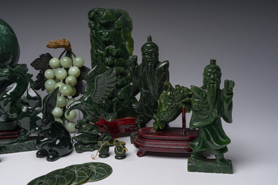 Sixteen Chinese green jade and hardstone sculptures, 20th C.